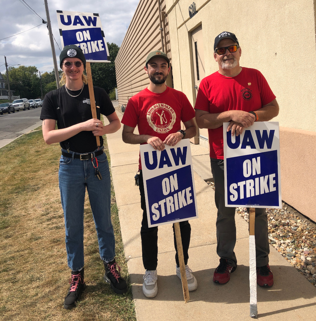 Local 997 president Steve Wentz (right), Peter (center), and Naomi (left)